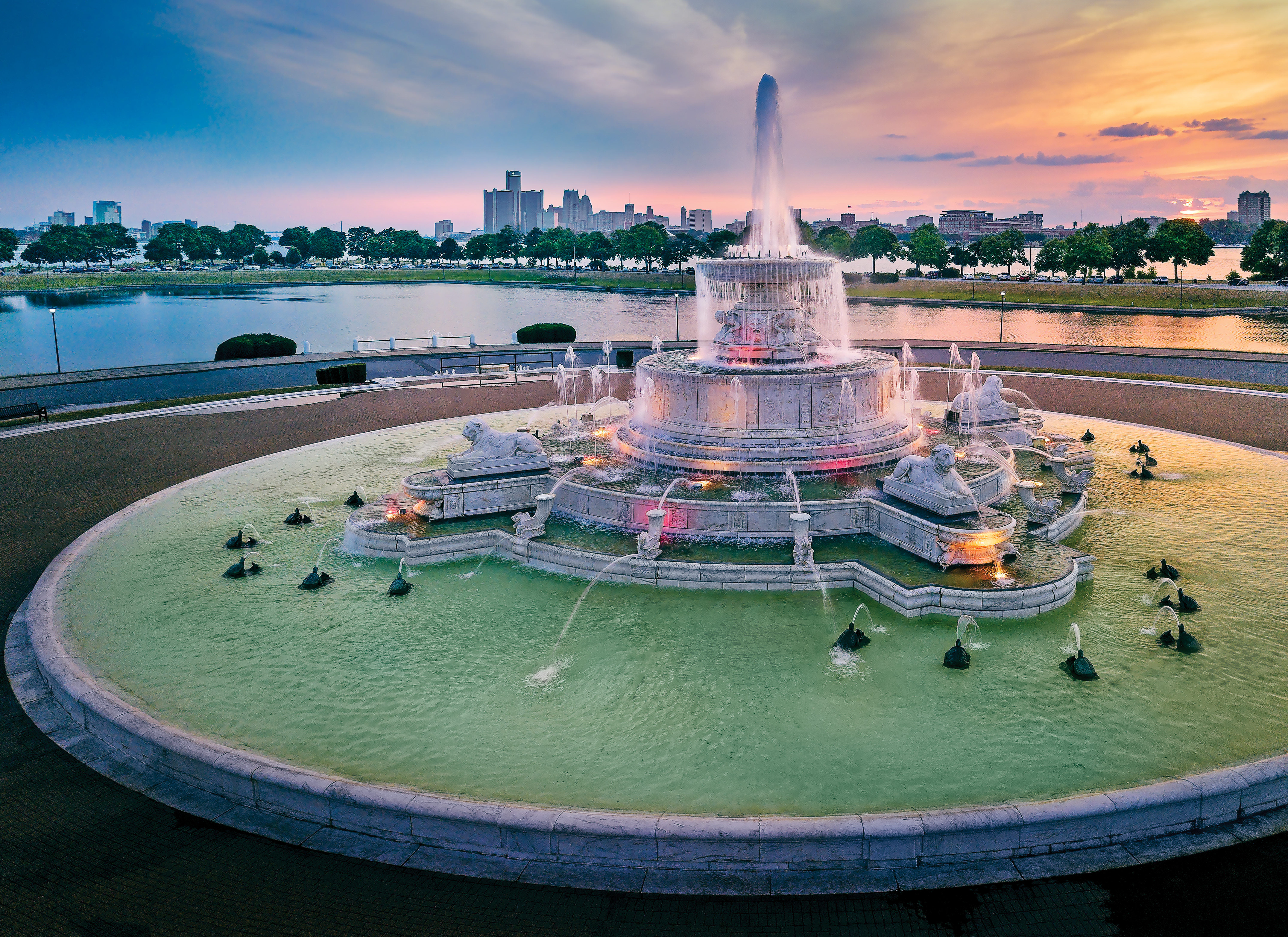 James Scott Memorial Fountain in Belle Isle Park A fountain near the riverbank with the Detroit skyline in the distance.