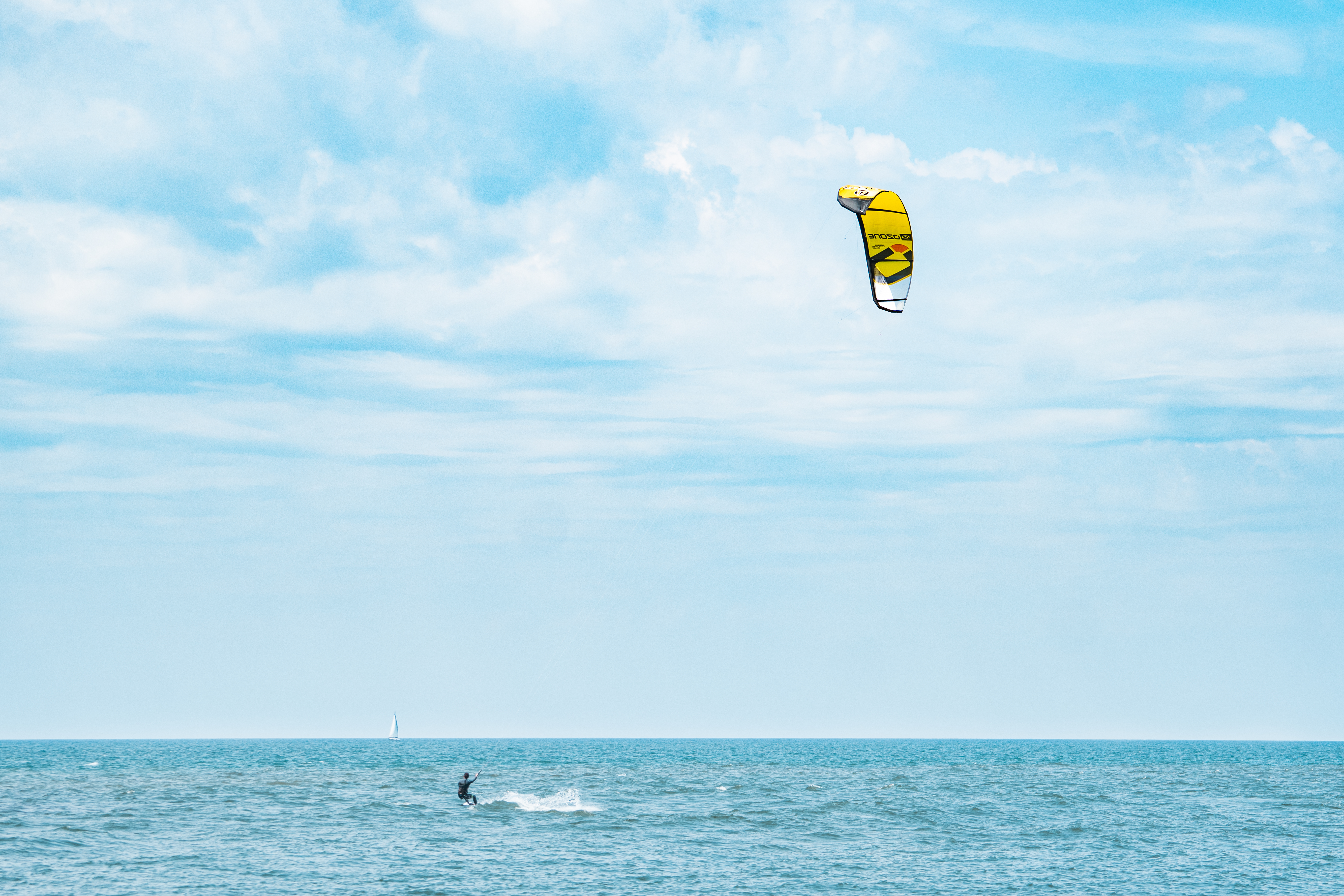Wind Surfing in St. Joseph A person wind surfing on Lake Michigan