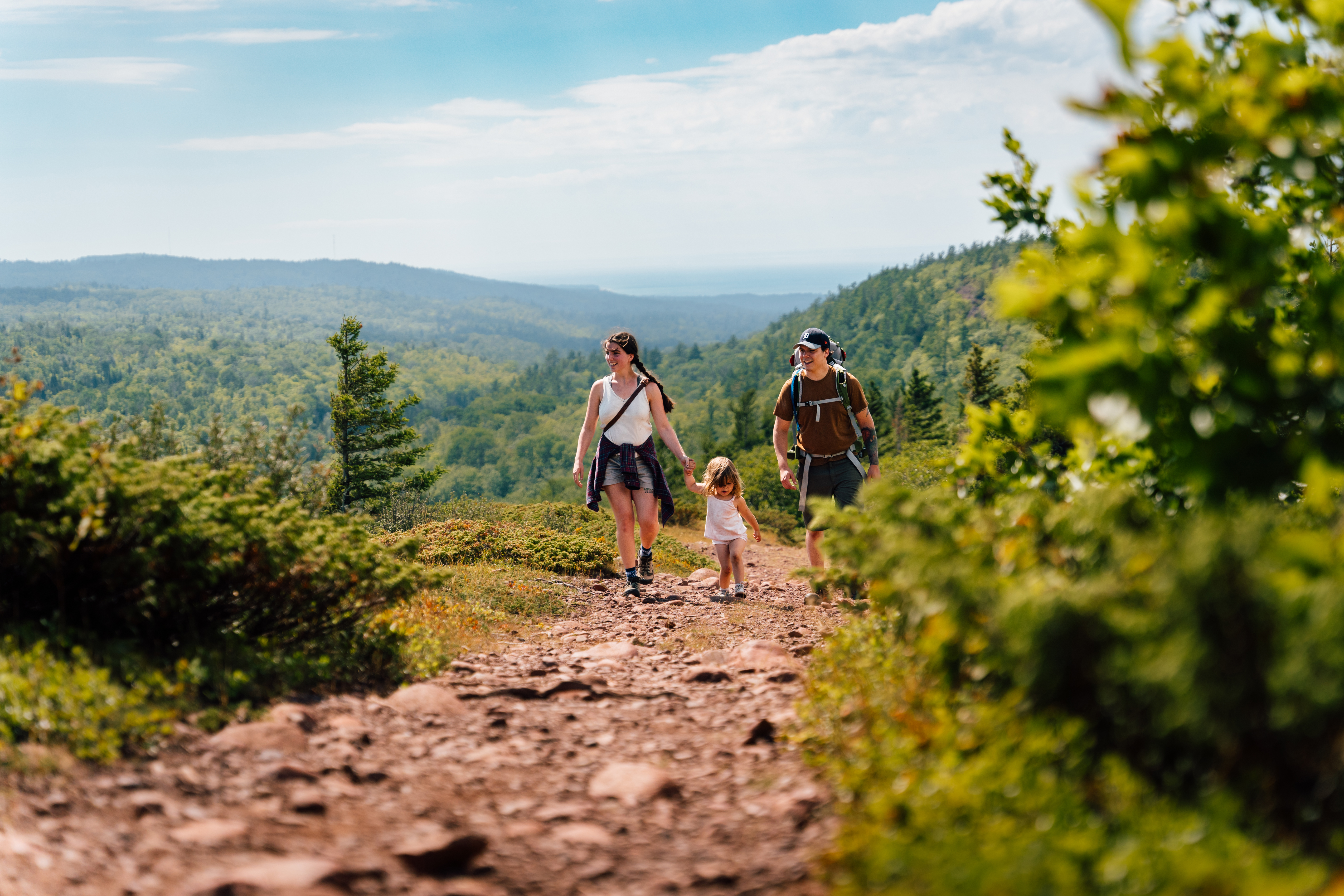 Mount Baldy A man, woman, and child walking on a trail on a mountain