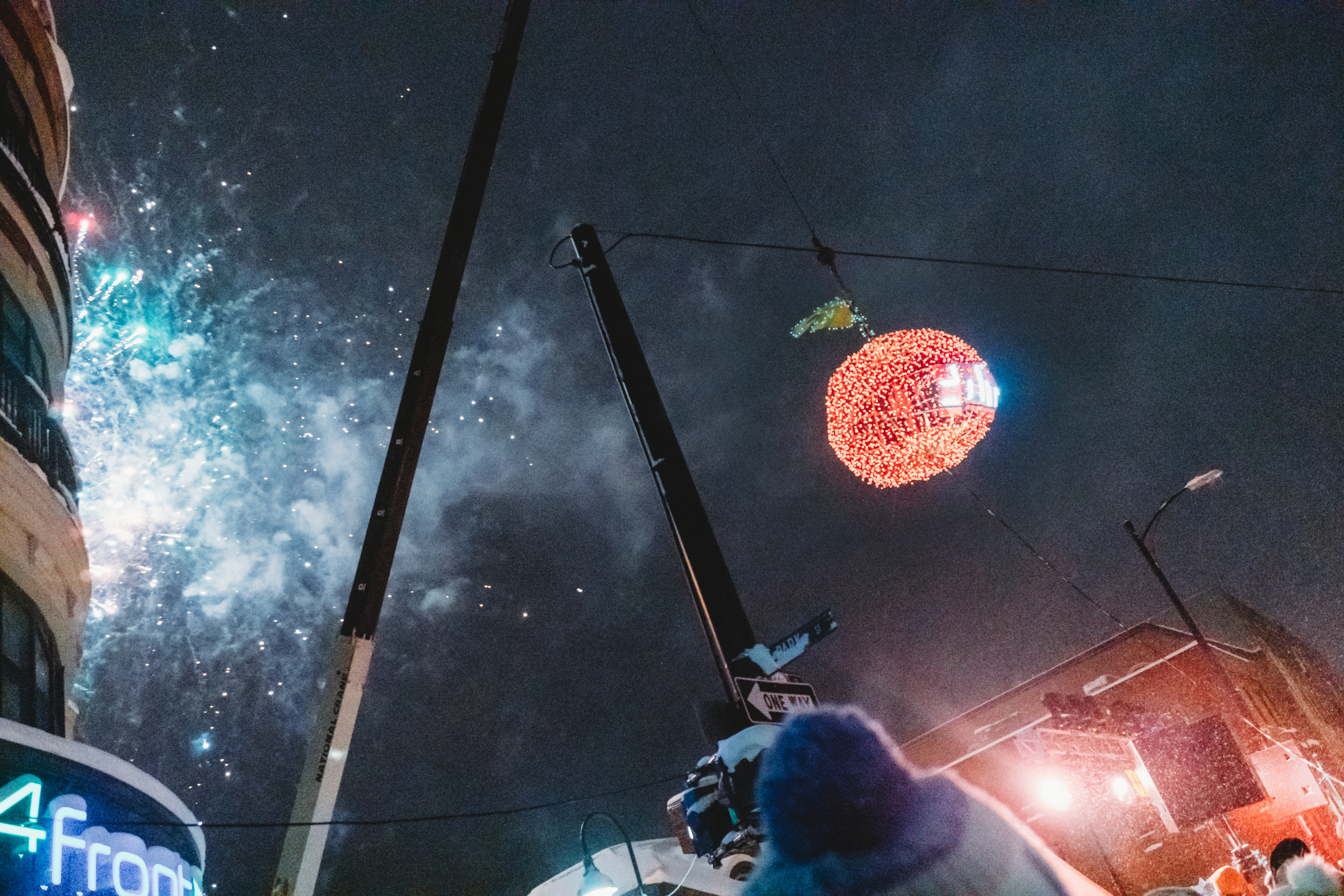 New Year's Even in Traverse City A cherry-shaped ball of lights hanging above a crowd