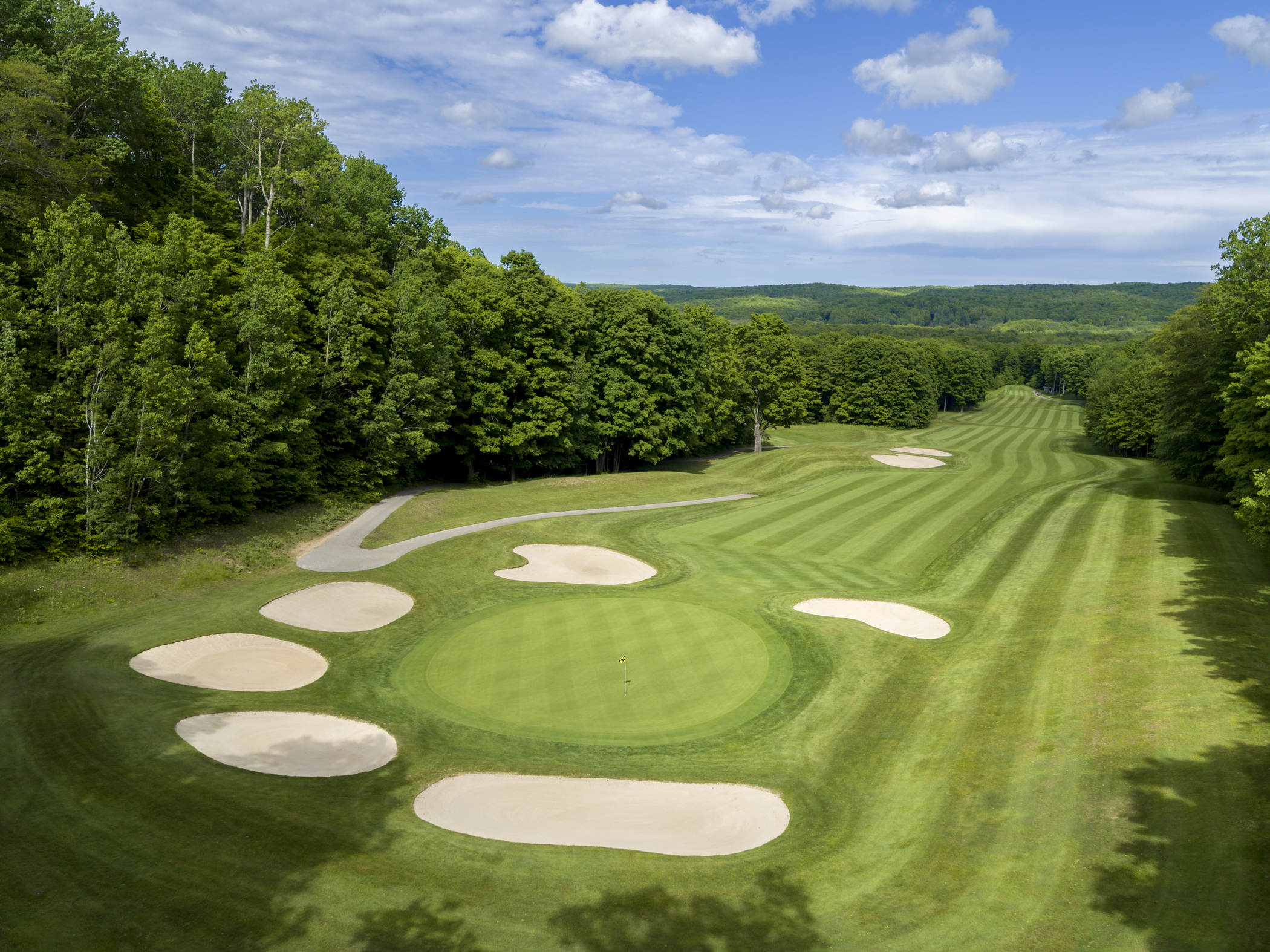 A golf course with sand traps. 