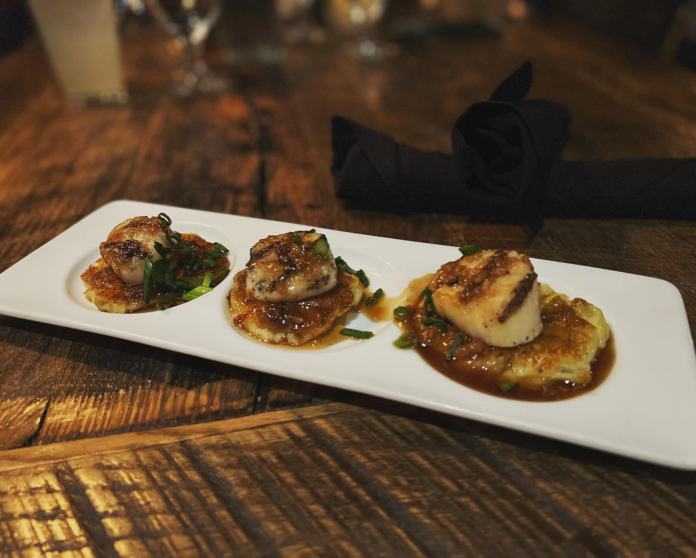 A grilled scallop dinner