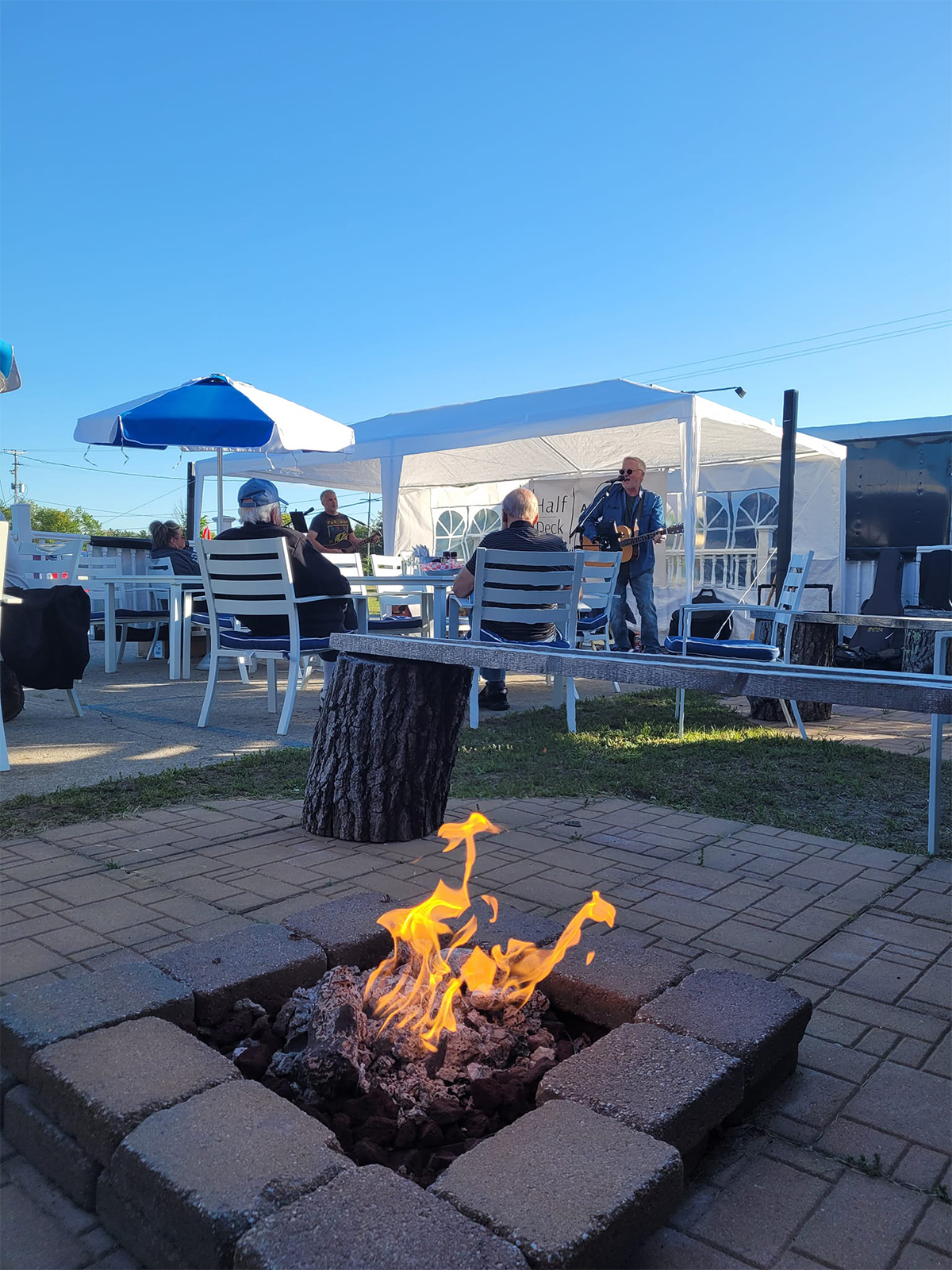 Wiltse’s Brew Pub & Family Restaurant A band playing at a patio dining area