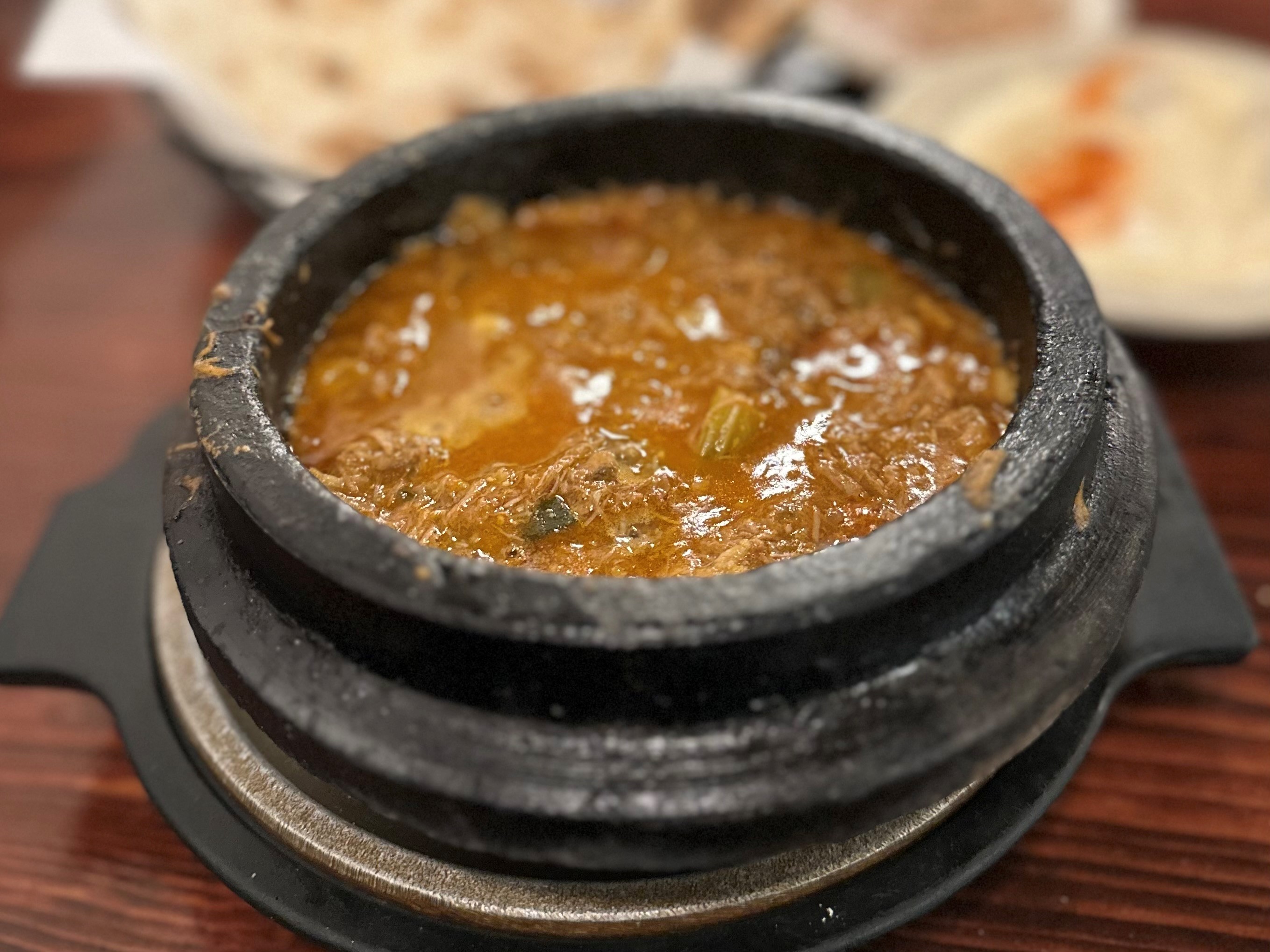 Sheeba A bowl of lamb stew served in a clay pot
