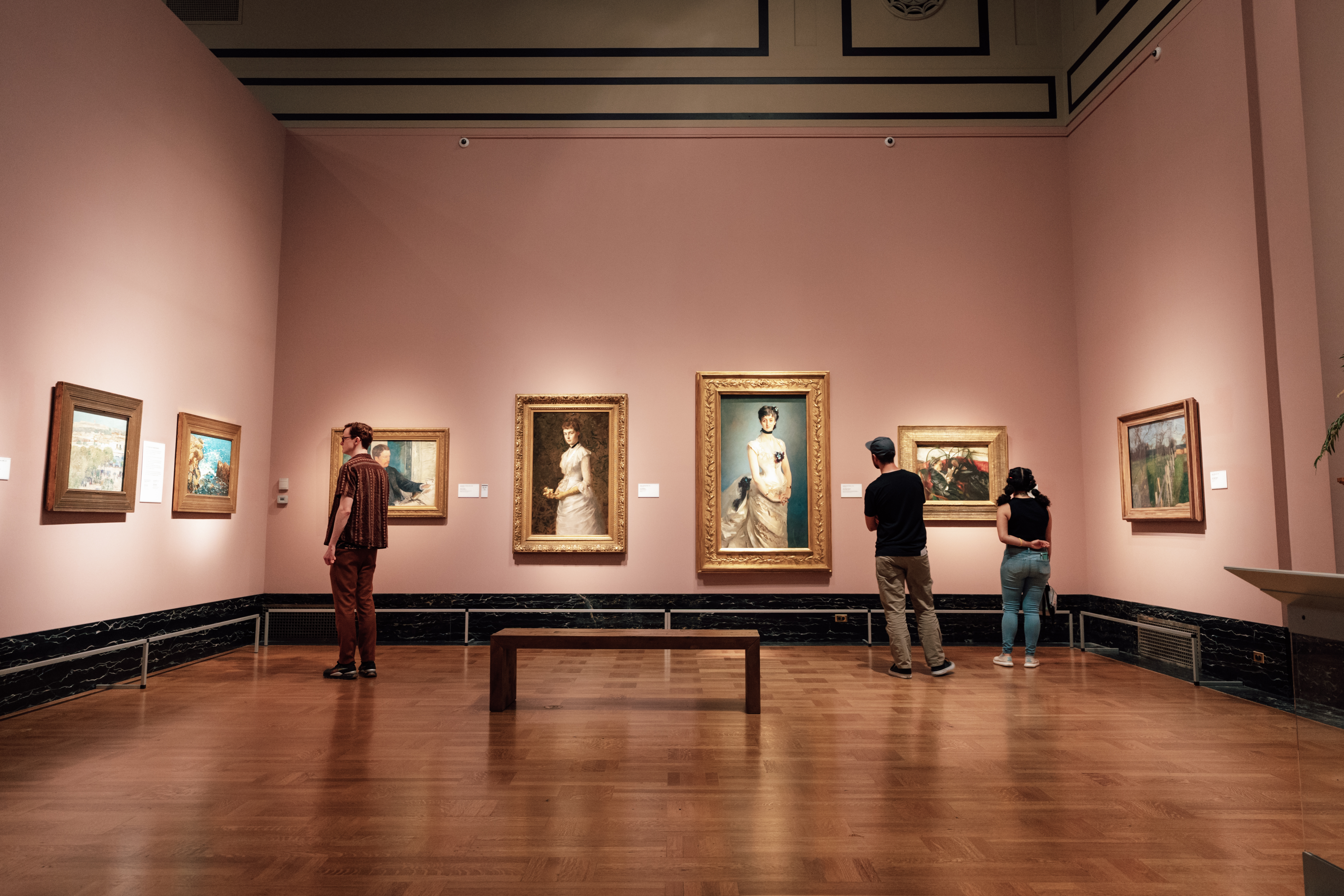 Detroit Institute of Arts People in a room with paintings on display