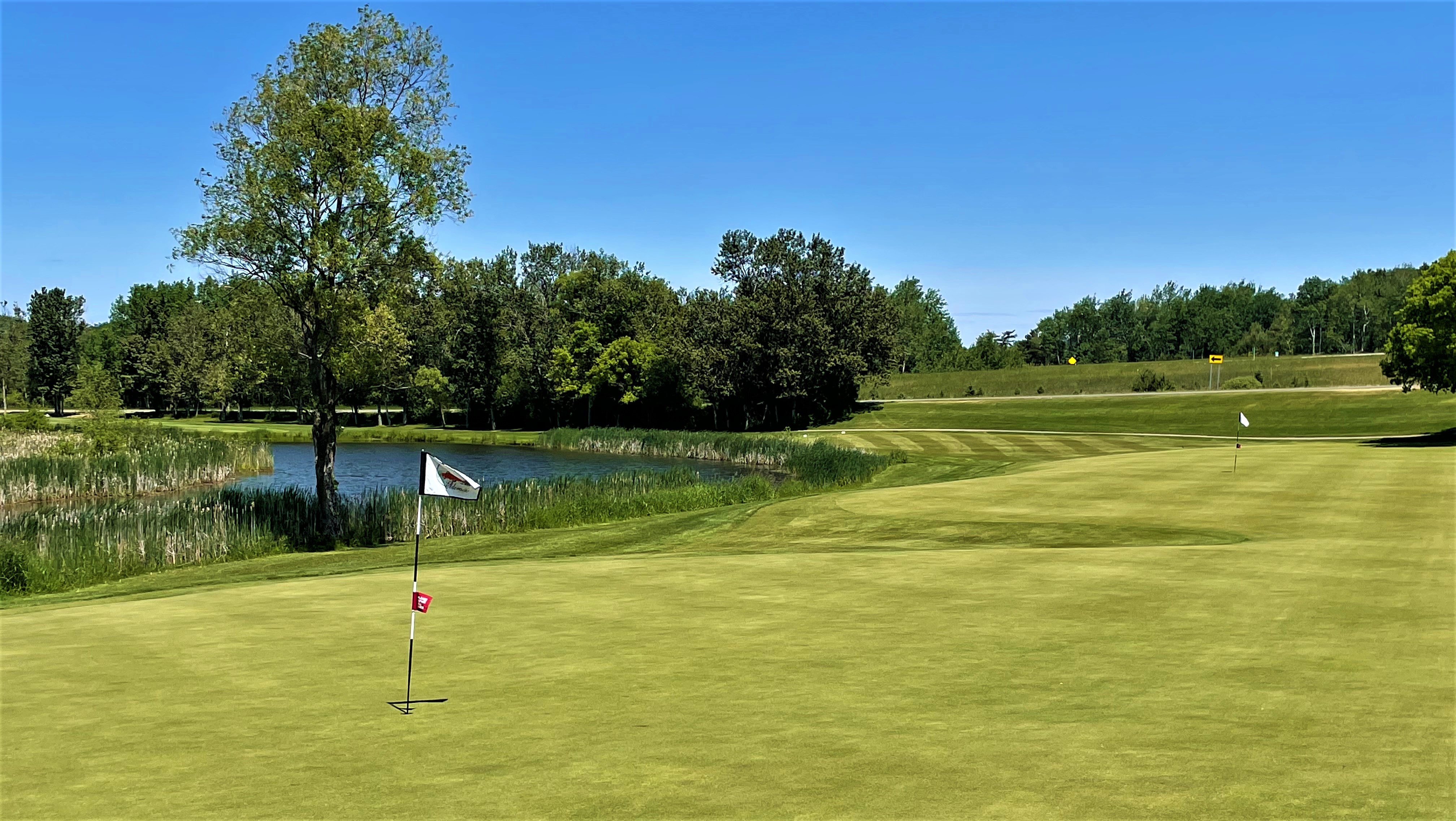 A hole near a pond at Eldorado Golf Course 