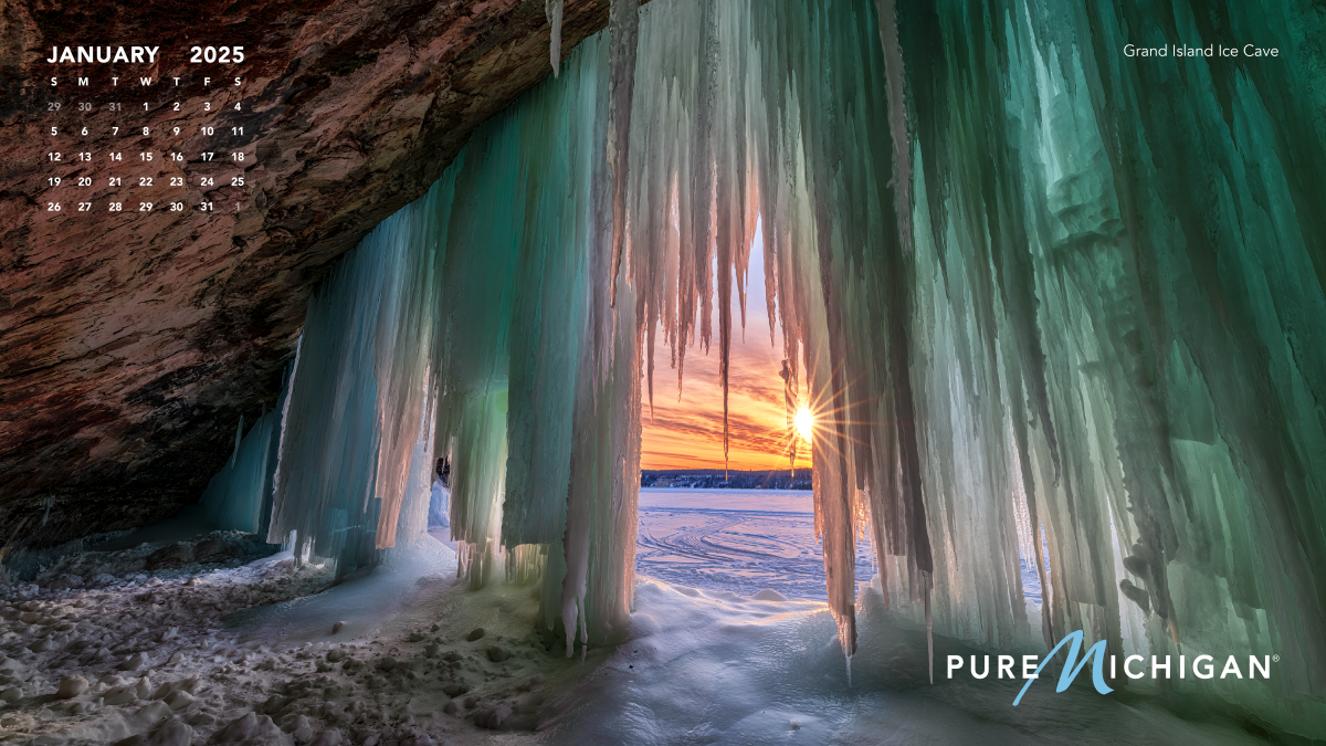 2025 Pure Michigan Calendar | January A photo of ice caves with a calendar graphic overlayed.
