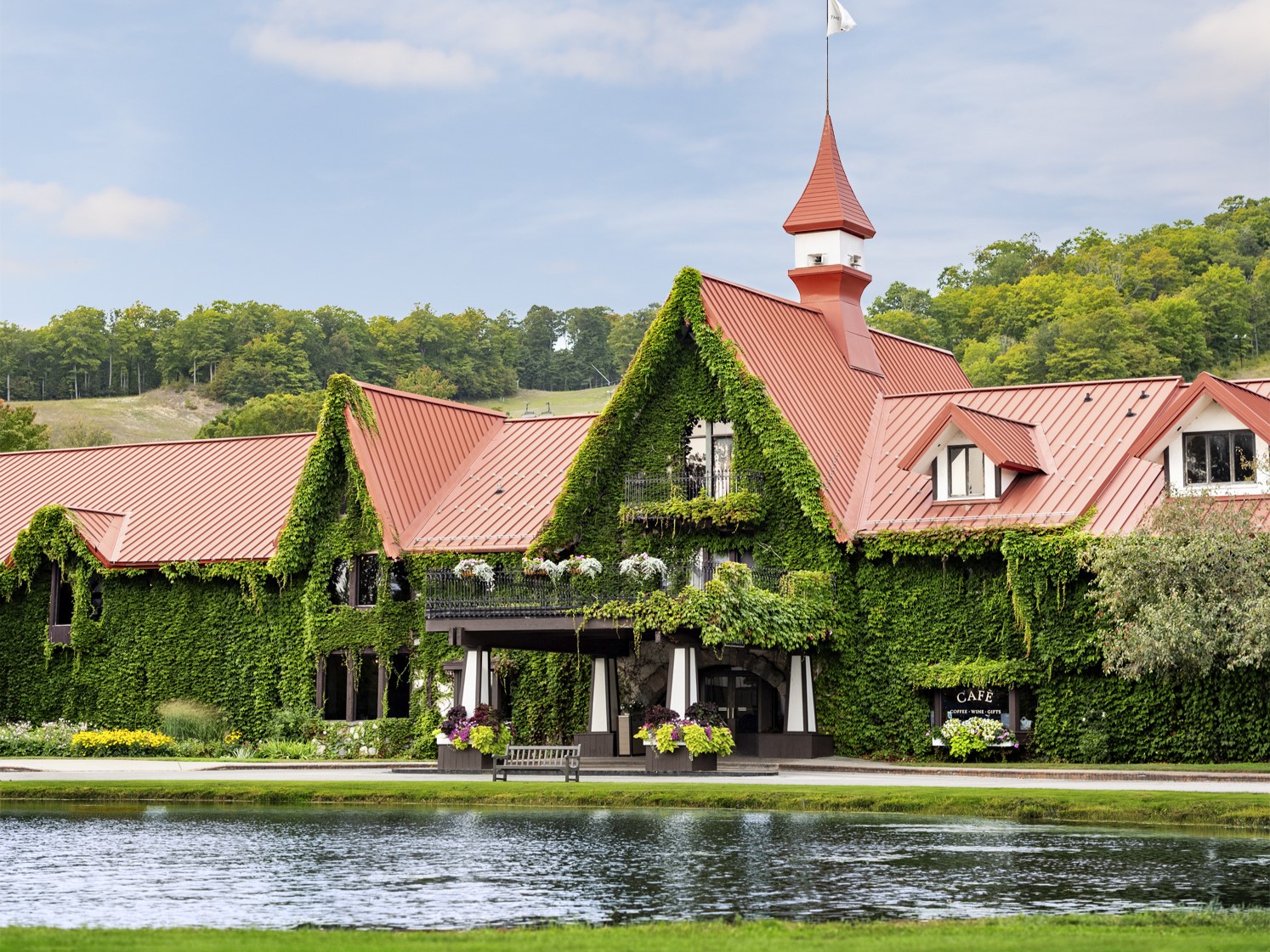 Exterior of the Highlands hotel covered in ivy. 