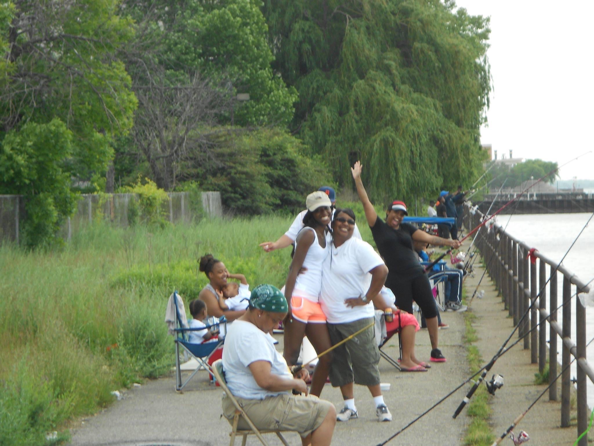 A group of women pier fishing in Detroit.