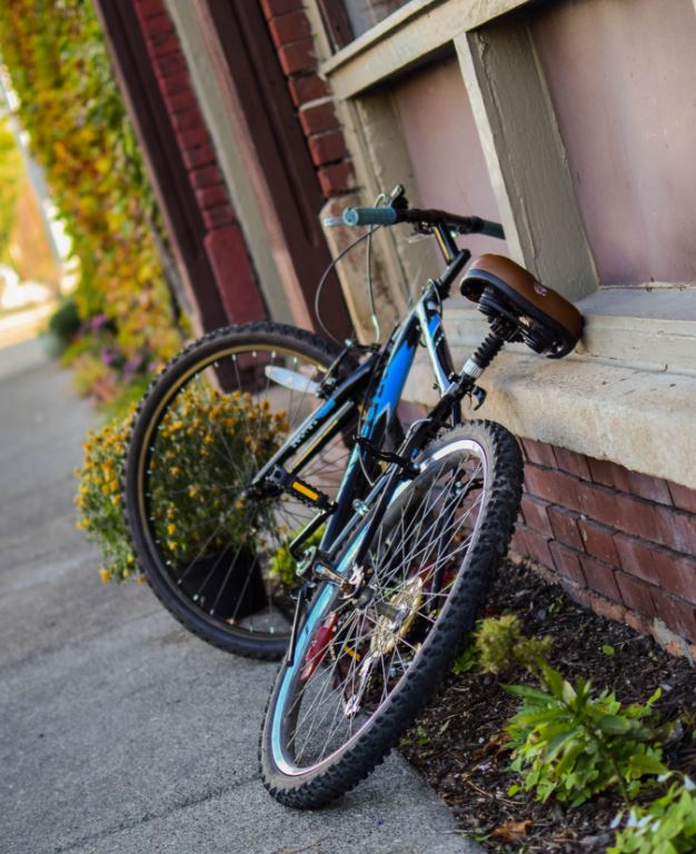 A bike resting in Detroit An inviting path in Detroit