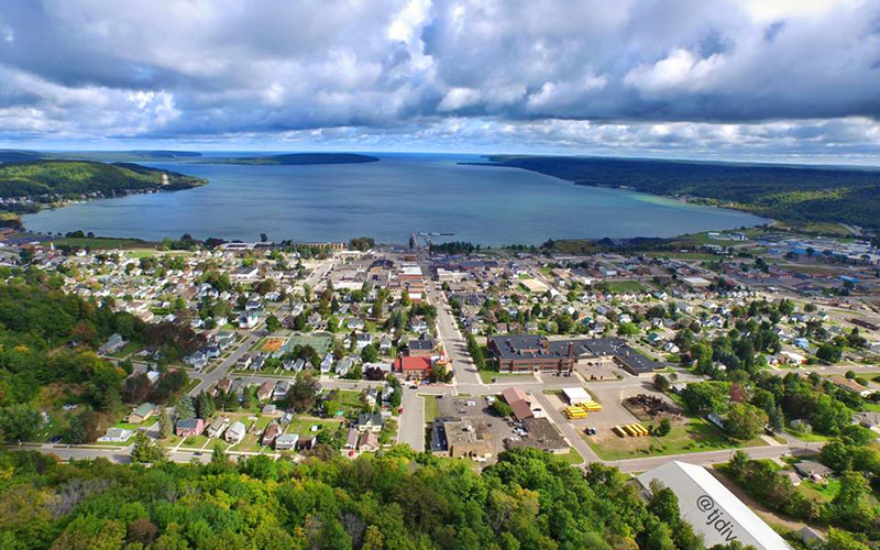 aerial view of the town with the lake in the background cloudy day