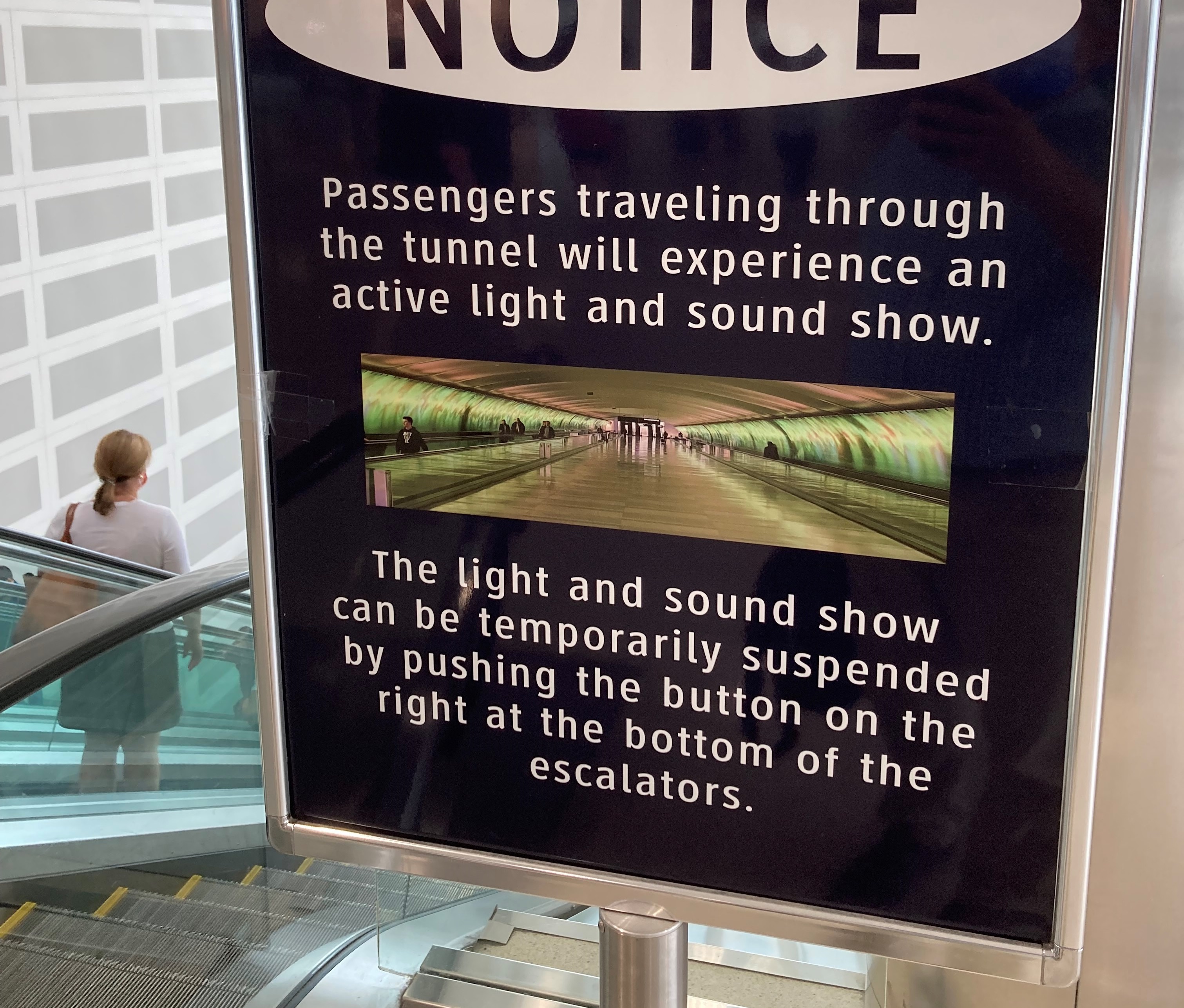 McNamara tunnel at Detroit Metro Airport A sign giving instructions for how to suspend lights and sounds in McNamara tunnel.