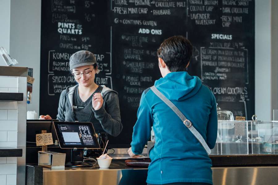 A woman ordering ice cream A woman ordering ice cream