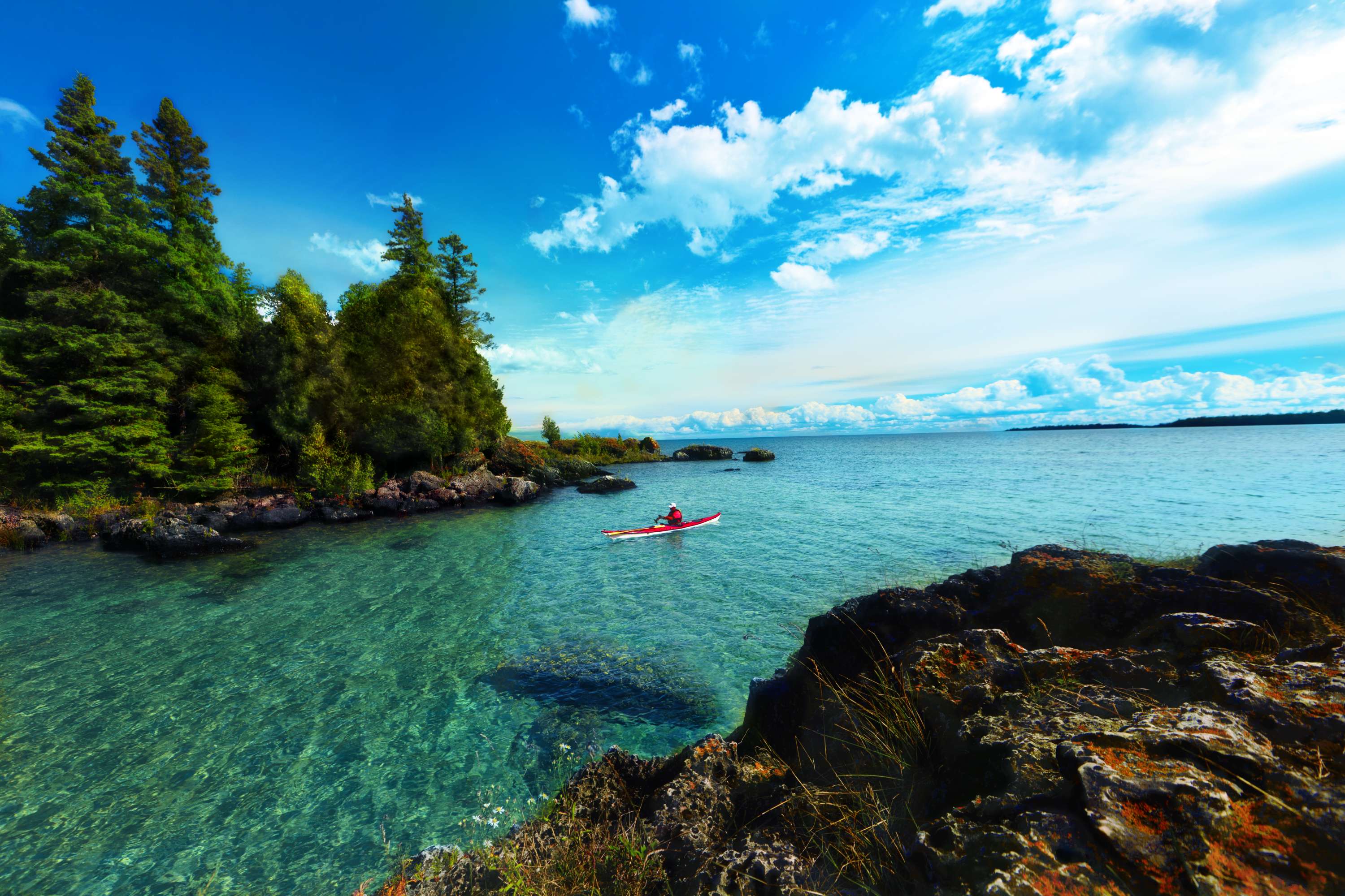 Kayaker in waters by Les Cheneaux Islands