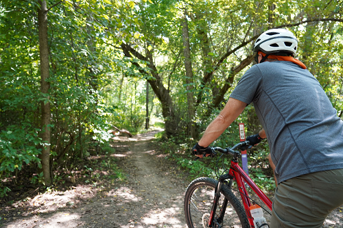 mountain biker on the trails inside the metro parks mountain biker on the trails inside the metro parks
