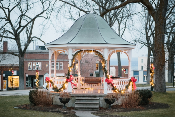 A gazebo in Petoskey decorated with garland.  
