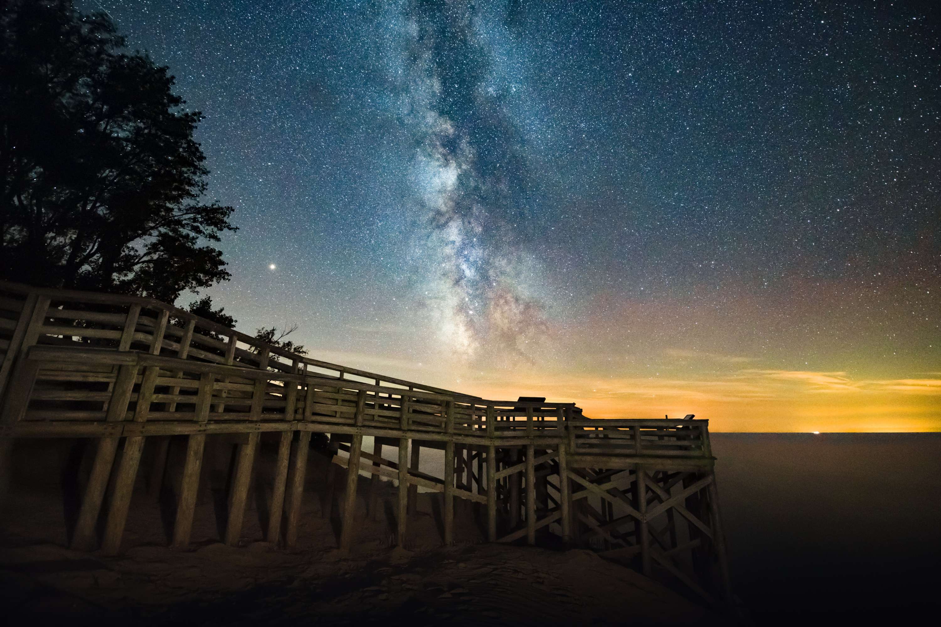 Dark skies over Pierce Stocking Drive Overlook on Lake Michigan under the Milky Way