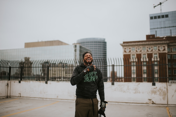 Adrian Butler on Grand Rapids rooftop. 
