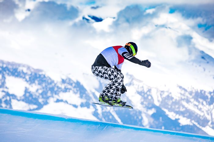 Nick Baumgartner snowboarding at event