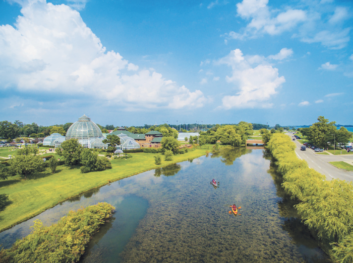 Kayakers on a river at Belle Isle Park.