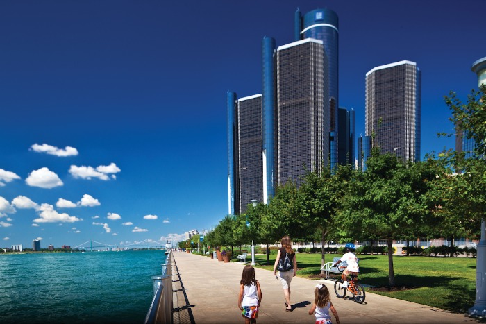 Family walking and biking on Detroit Riverwalk