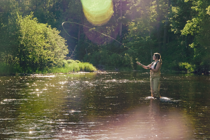 Fly fishing in the Au Sable River in Grayling