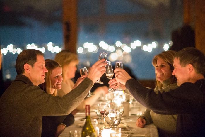 Friends making a toast at Boyne Highlands Resort