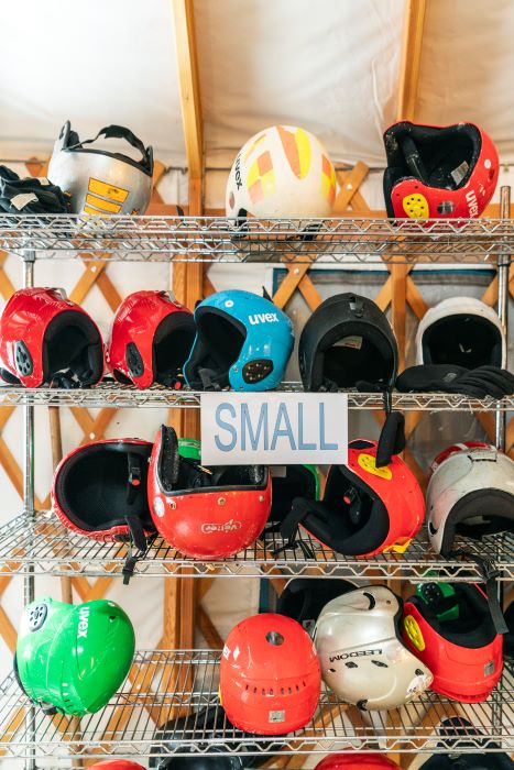 Rental helmets on shelf at the Muskegon Winter Sports Complex.
