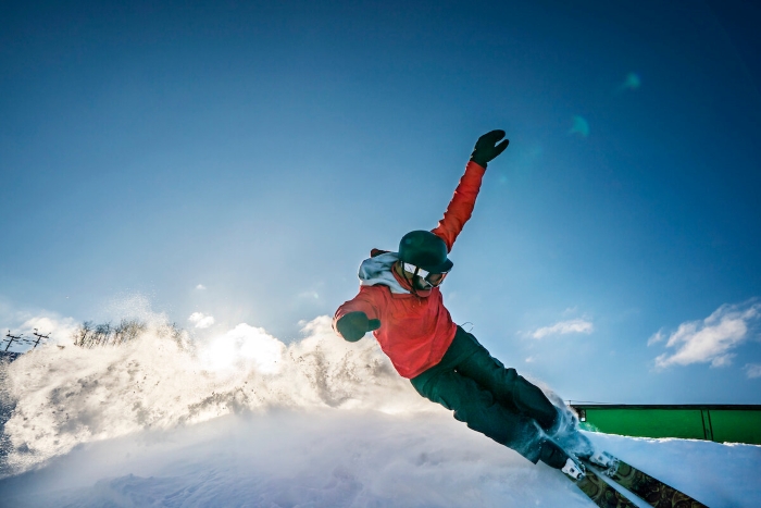 Man downhill skiing at Nub's Nob.