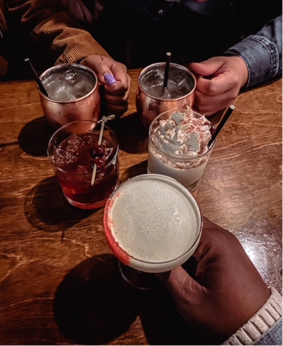 Various cocktails on a table.