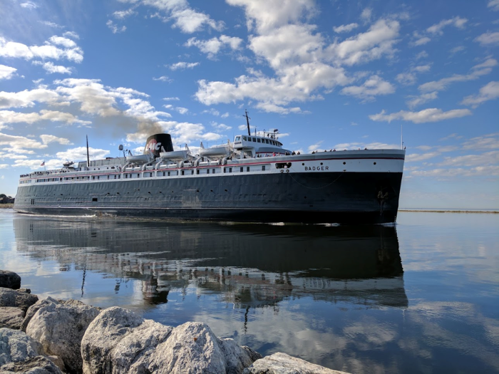 The S.S. Badger boat traveling towards Lake Michigan.