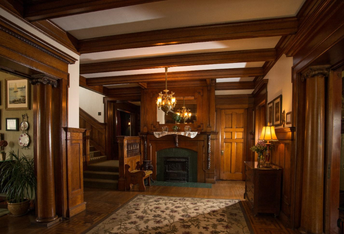 A fireplace inside a historical home on East Ludington Avenue.