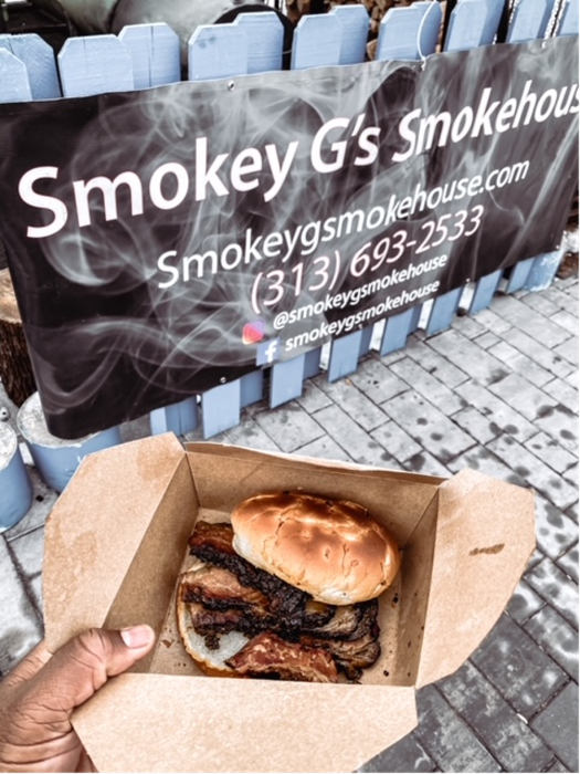 Beef brisket barbeque sandwich in a to go box.