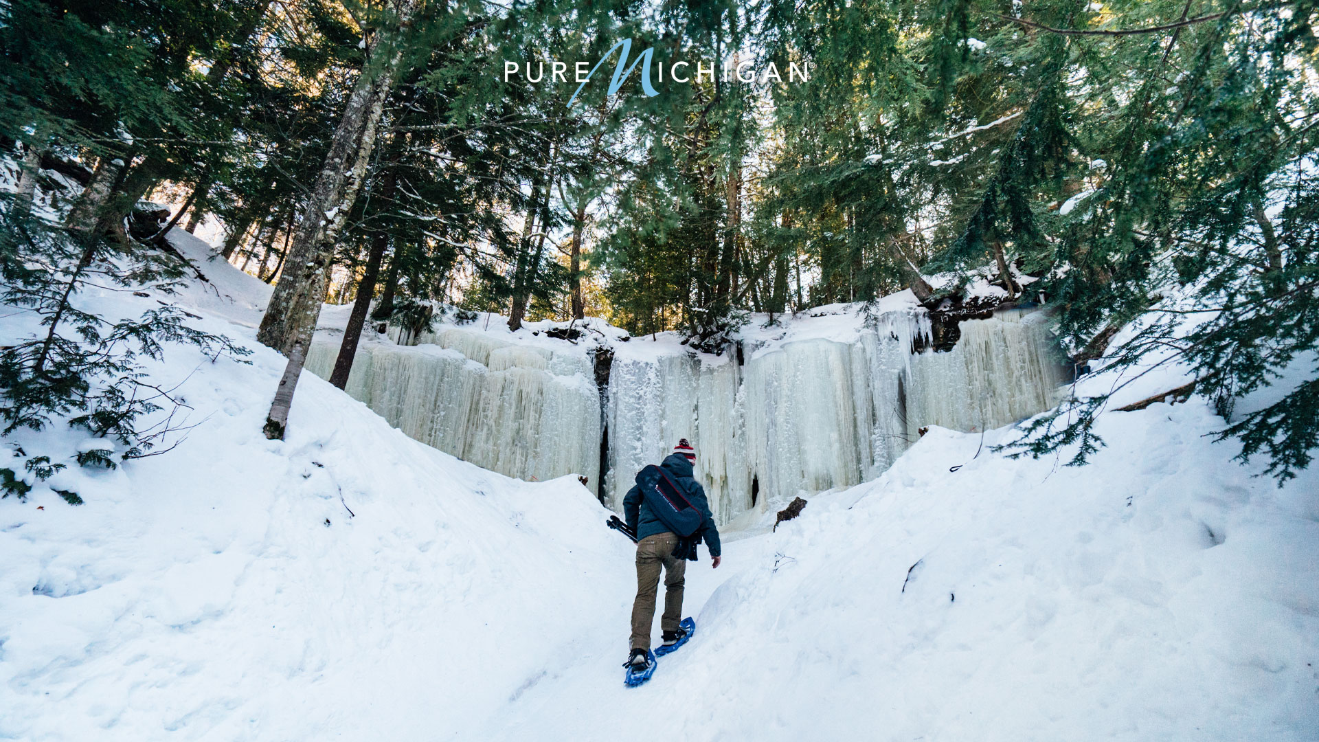 Hiker exploring the Eben Ice Caves