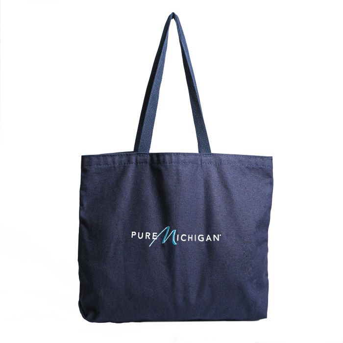 A fabric tote back with the Pure Michigan logo embroidered on the front.