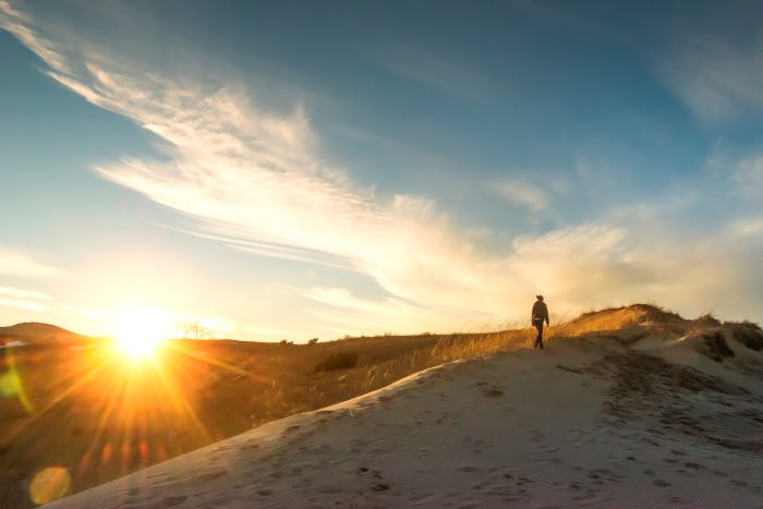 Hiking along the Sleeping Bear Dunes at sunset