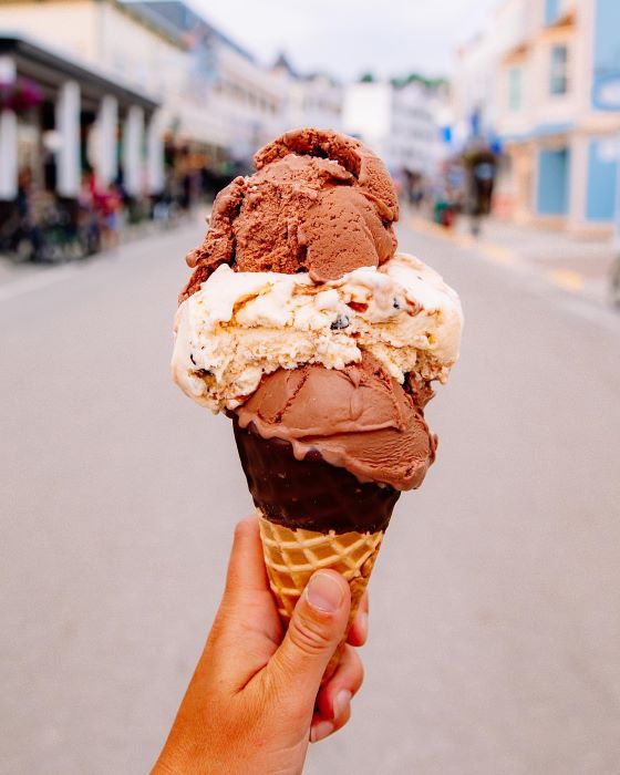 Woman holding ice cream cone