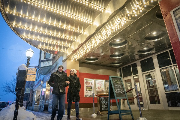 Couple walking in downtown Marquette during winter