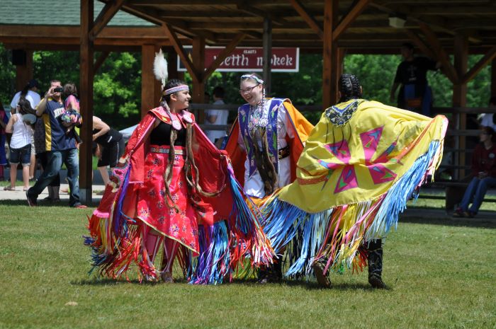 Teens dancing in traditional clothing at Great Lakes Area Traditional Pow Wow 