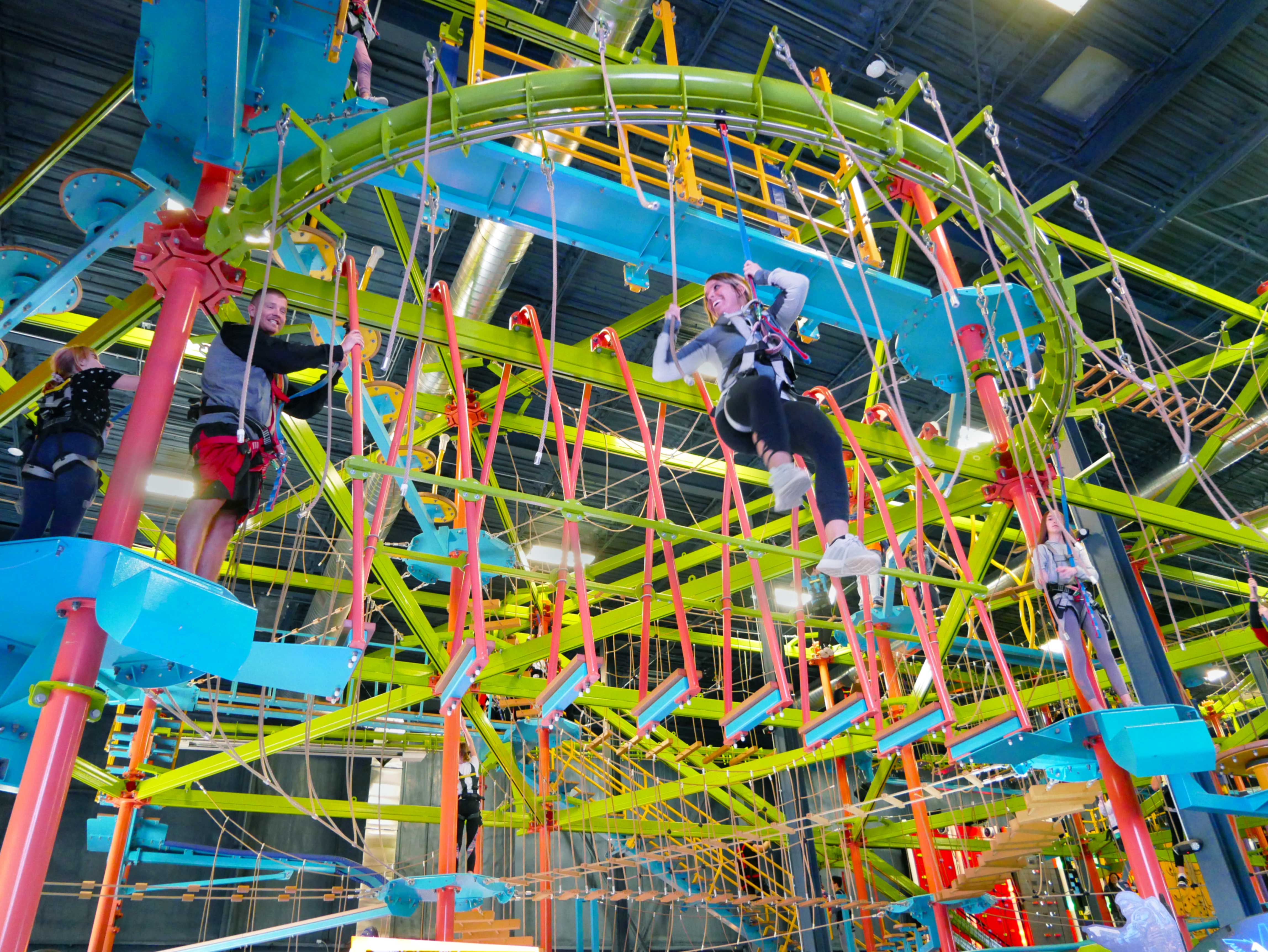 Smiling Woman on SkyTrail Ropes course Photo 2