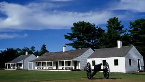 Cannon and buildings at Fort Wilkins State Park Photo