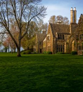 view of the home of Edsel & Eleanor Ford, large brick home with many peaks
