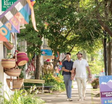 A couple walking in downtown Saugatuck