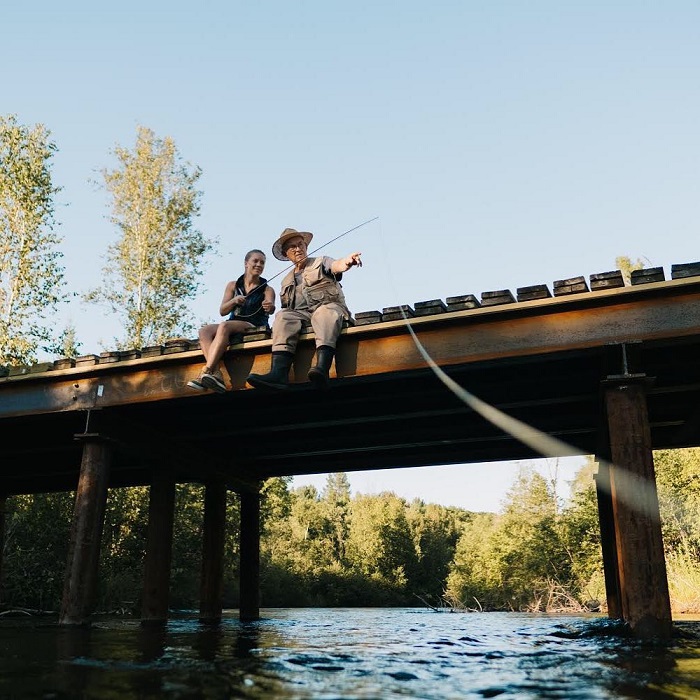 Fishing on a Bridge at Boardman River in Traverse City