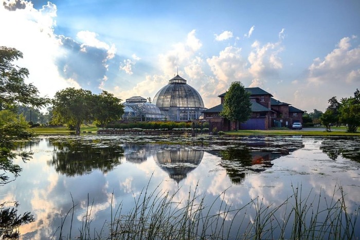 Anna Scripps Whitcomb Conservatory by pond