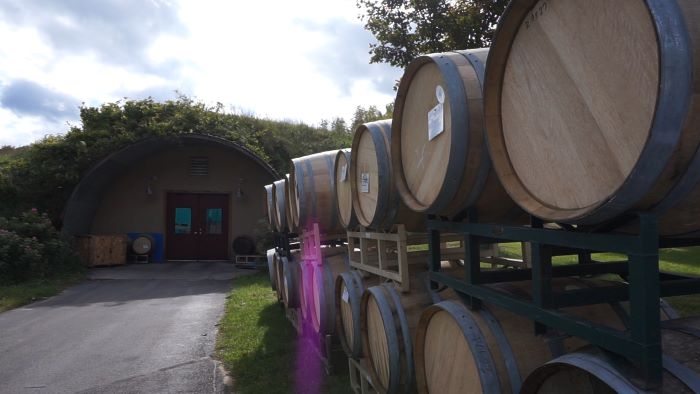 Wine barrels outside wine cellar at Black Star Farms