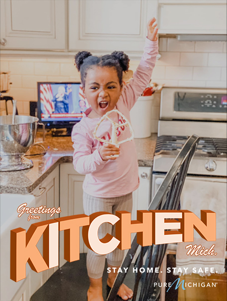 Little Girl in Kitchen with text that reads "Greetings from Kitchen, Michigan."